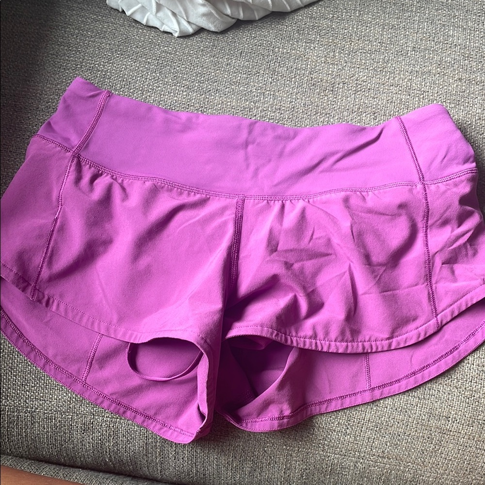 Women's purple Lululemon low rise speed up sporty shorts, size 2.